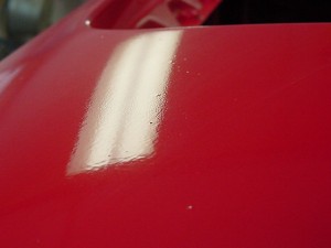 orange peel on hood of car